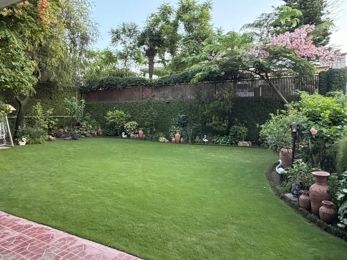 The garden of the author’s childhood home in Islamabad, the real playground behind the novel